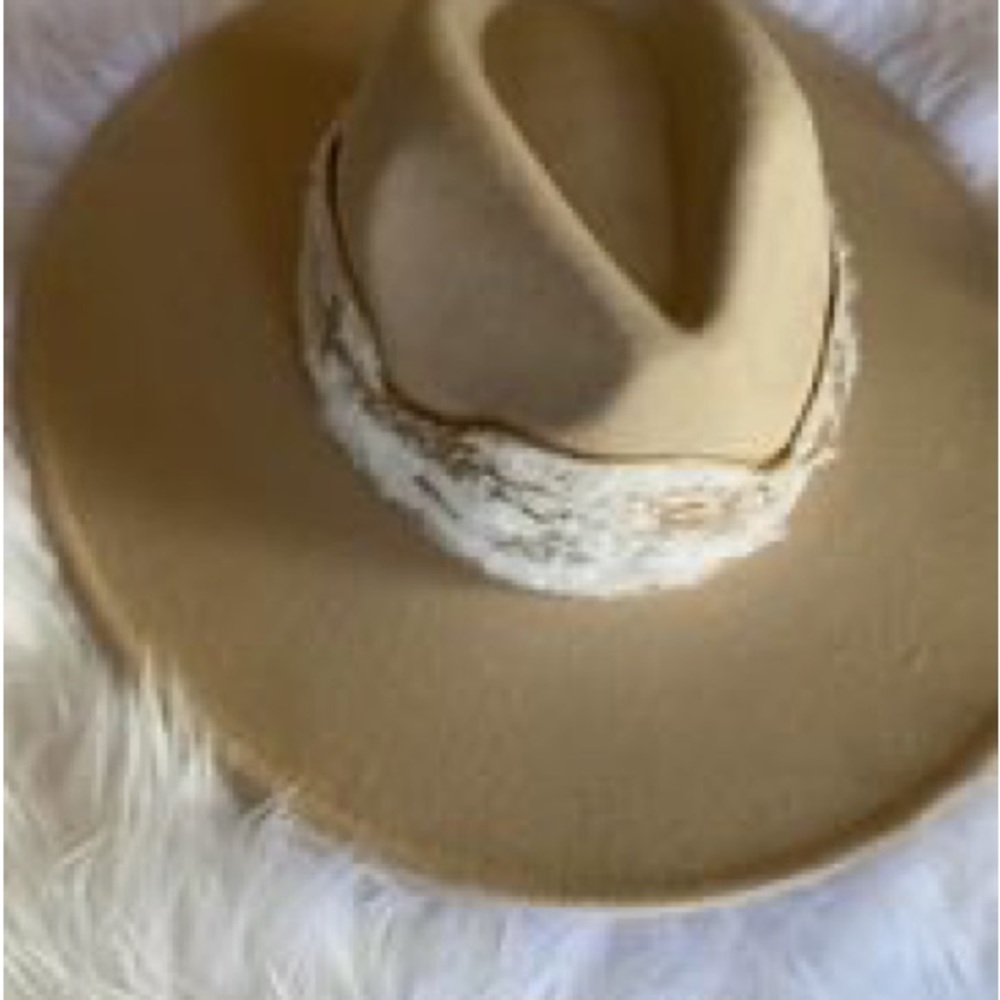 cream wide brim hat with white and gold band